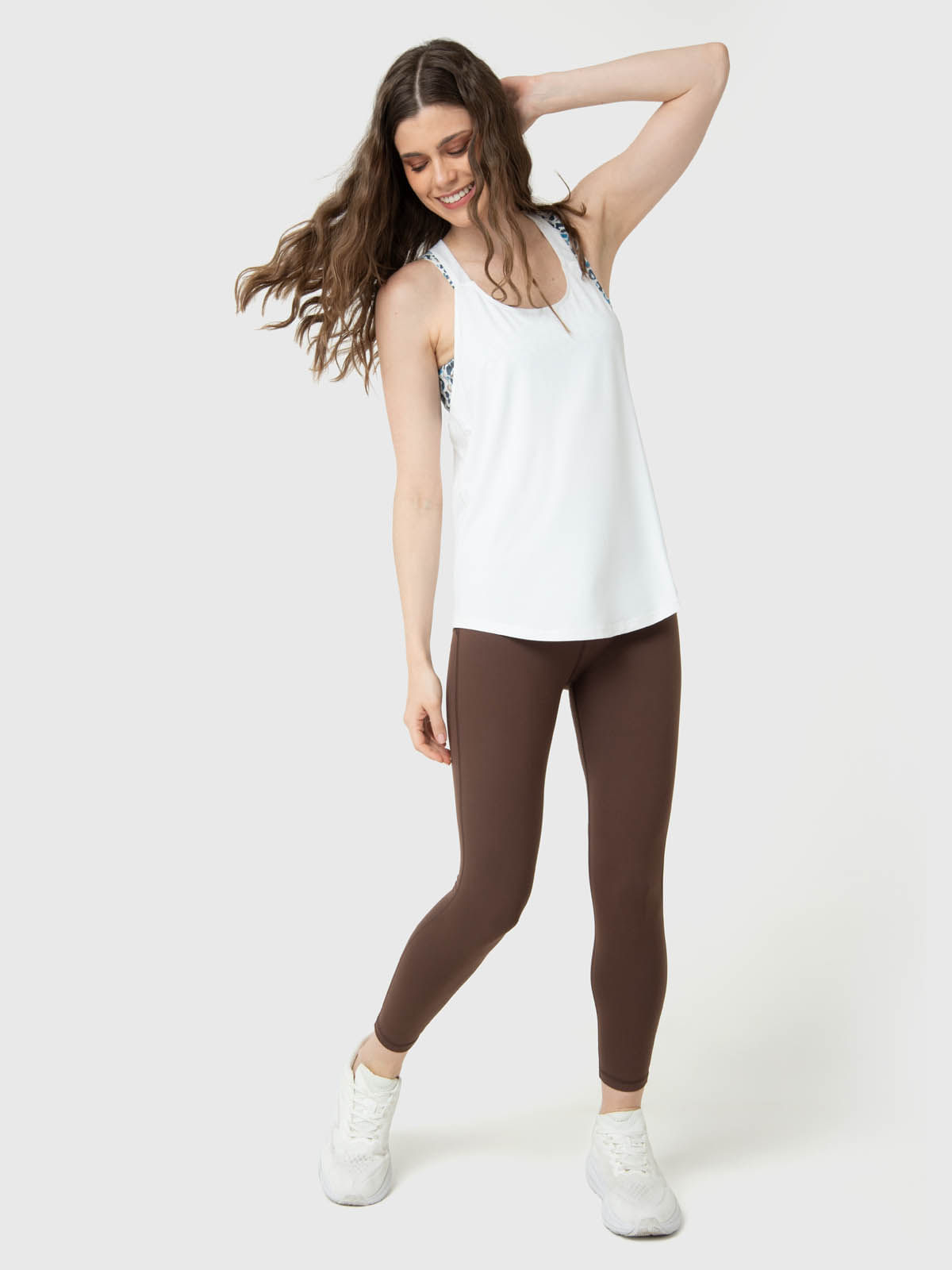 Polo-Sin-Manga-Para-Mujer-Training-Tank-Aloe-Blanco-Bsoul